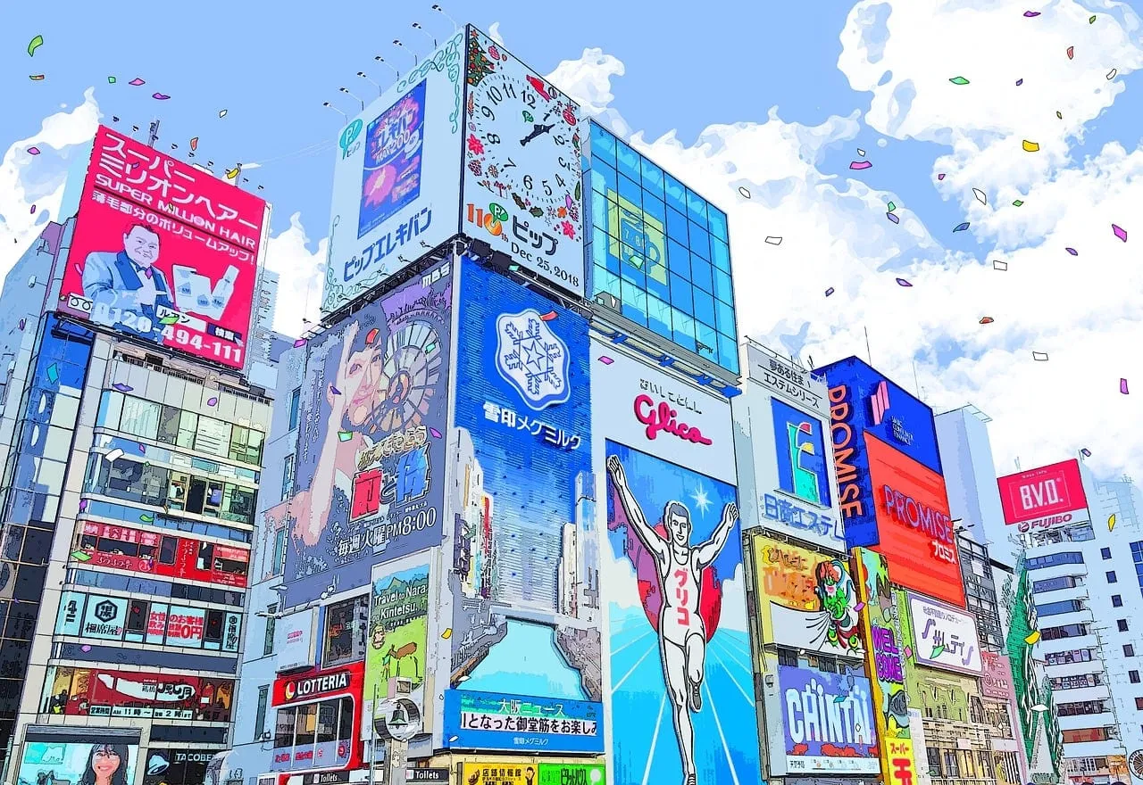 Carteles sobre el canal de Dotonbori, con el corredor de Glico